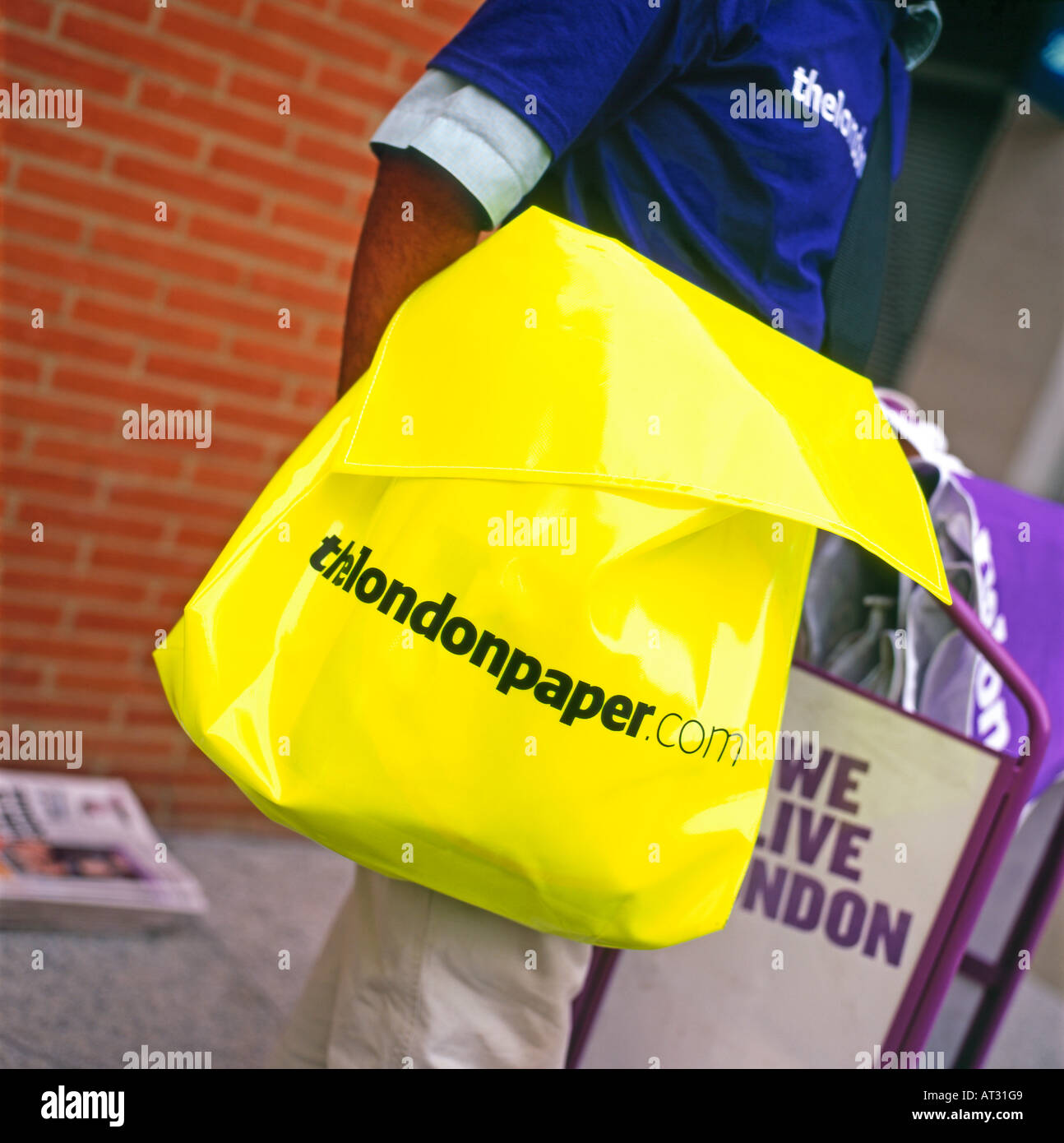 The londonpaper.com free newspaper being handed out on the streets of London UK Stock Photo
