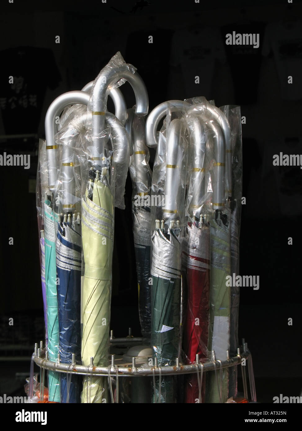Plastic umbrella stand hires stock photography and images Alamy