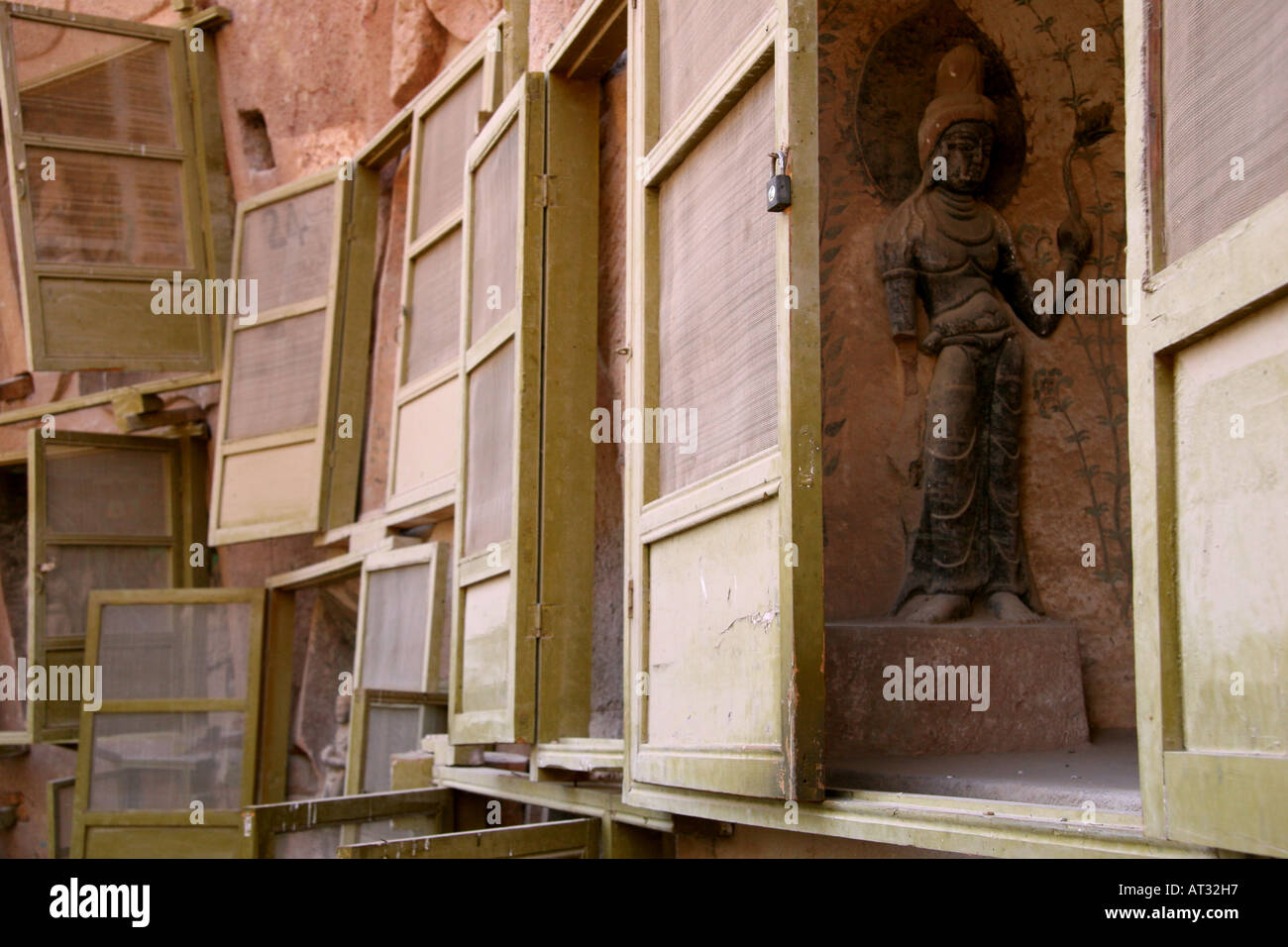 One of hundreds of statues at Bingling Si, Buddhist Grottoes, off a branch of the Yellow River, China Stock Photo