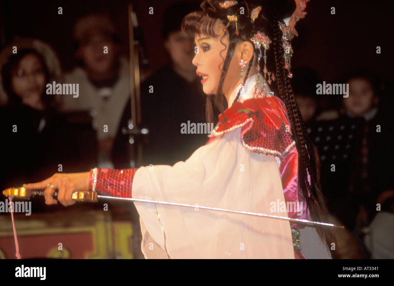 Sword chinese performing woman tradition hi-res stock photography and ...