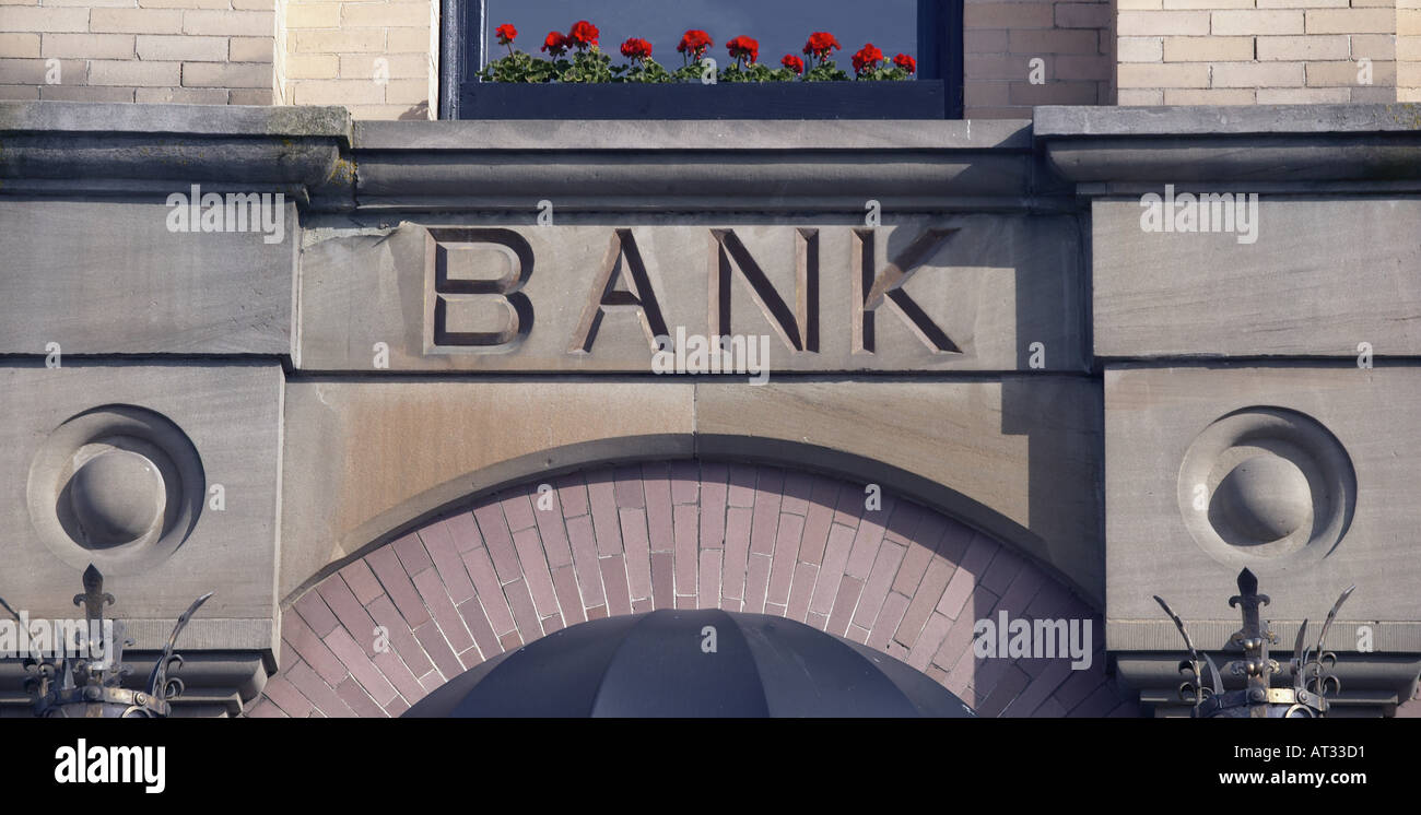 Etched Granite Sign on Bank Facade Stock Photo