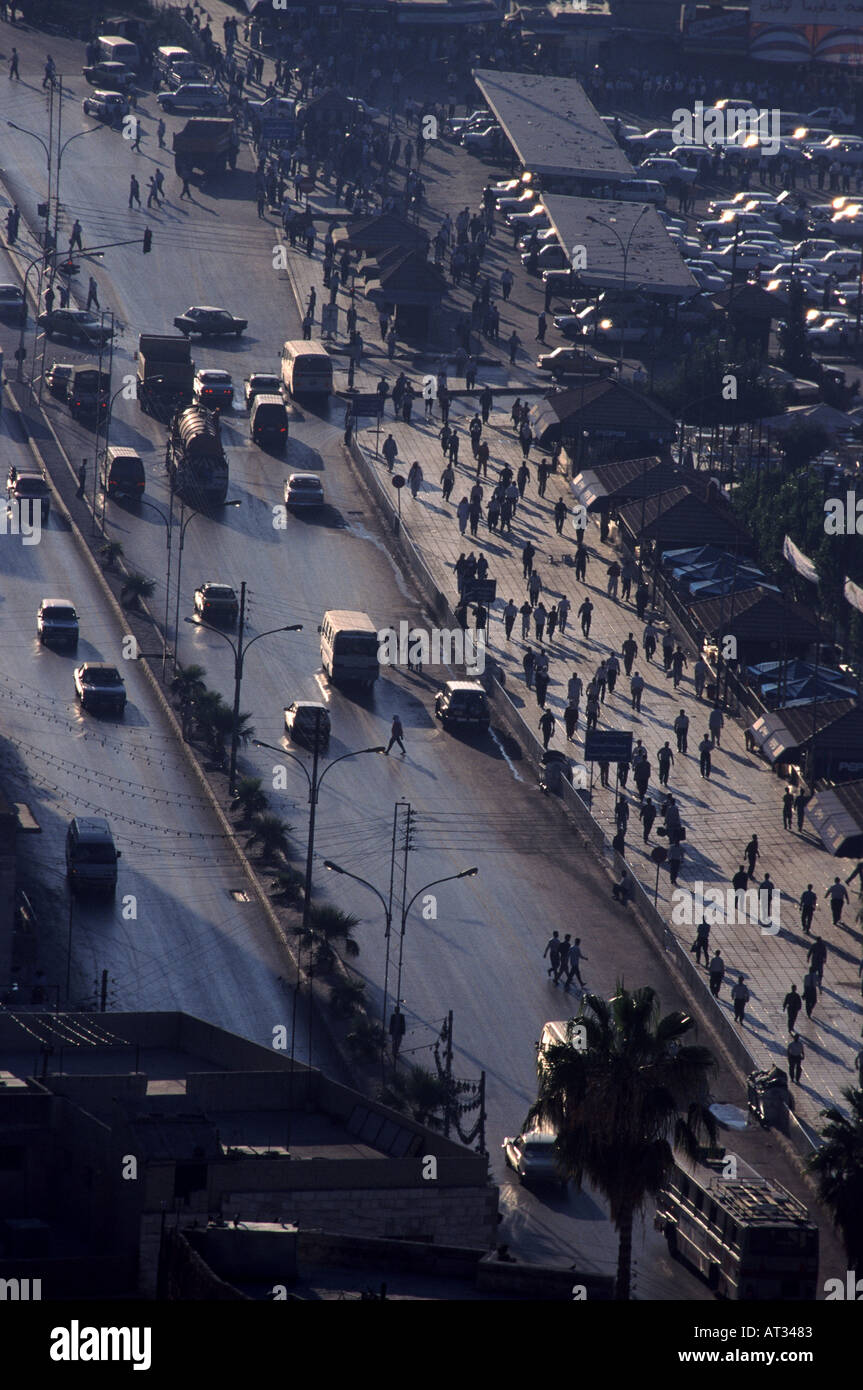 Early morning commuters at downtown bus and taxi station in Amman Jordan Stock Photo