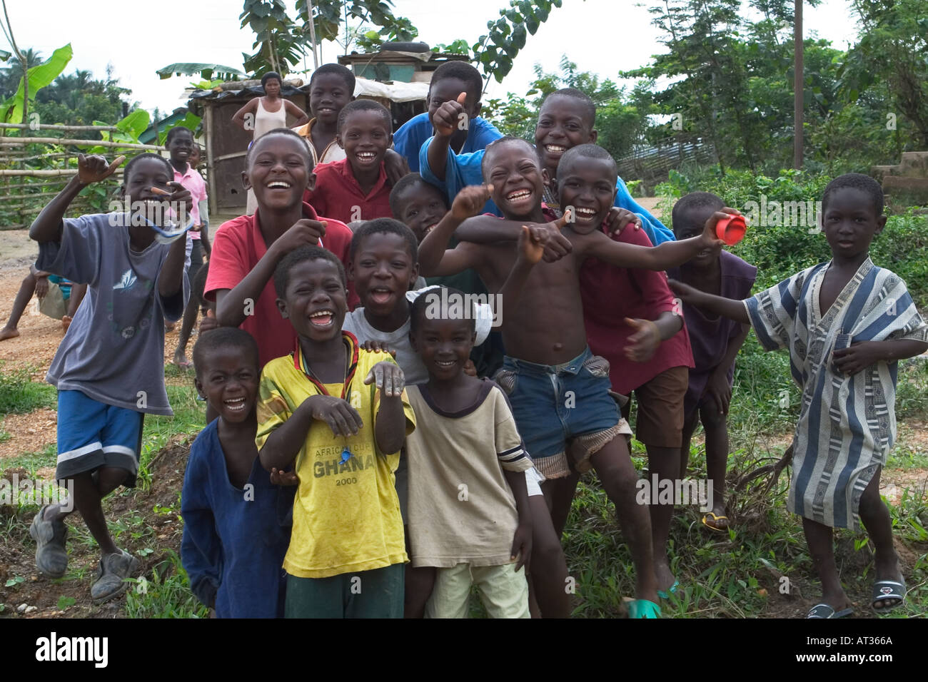 Group of happy young African boys having fun in village Ghana West