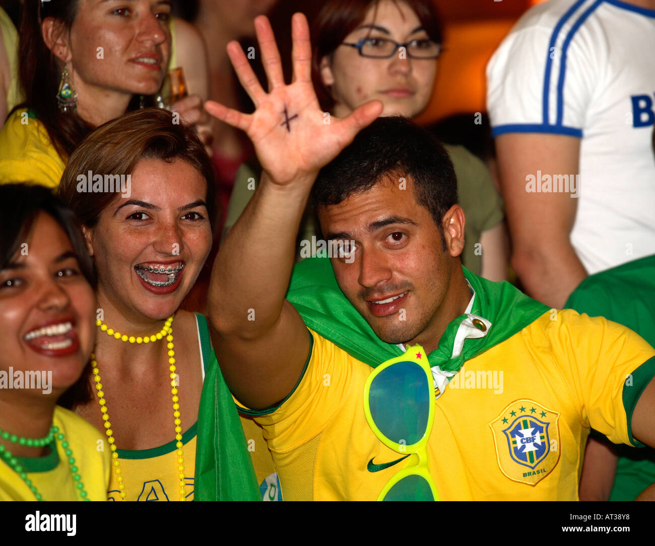 Brasilian fans cheering on their team in 2006 World Cup quarter-final vs France, On Anon Bar, London Stock Photo