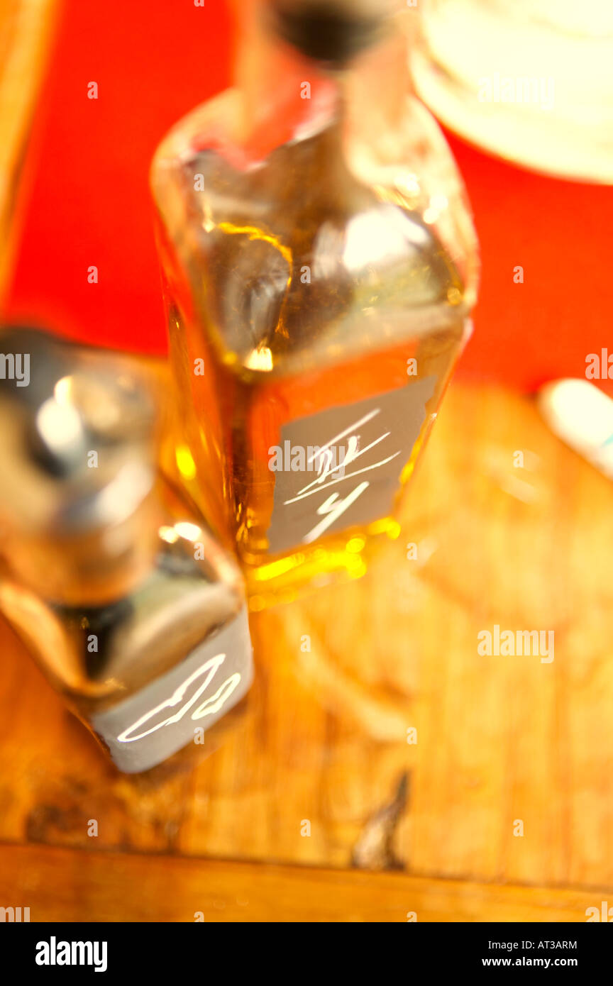 Oil and vinegar bottles on a table Stock Photo Alamy