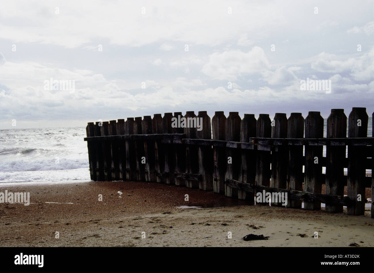 Wooden breakers on a beach Stock Photo Alamy