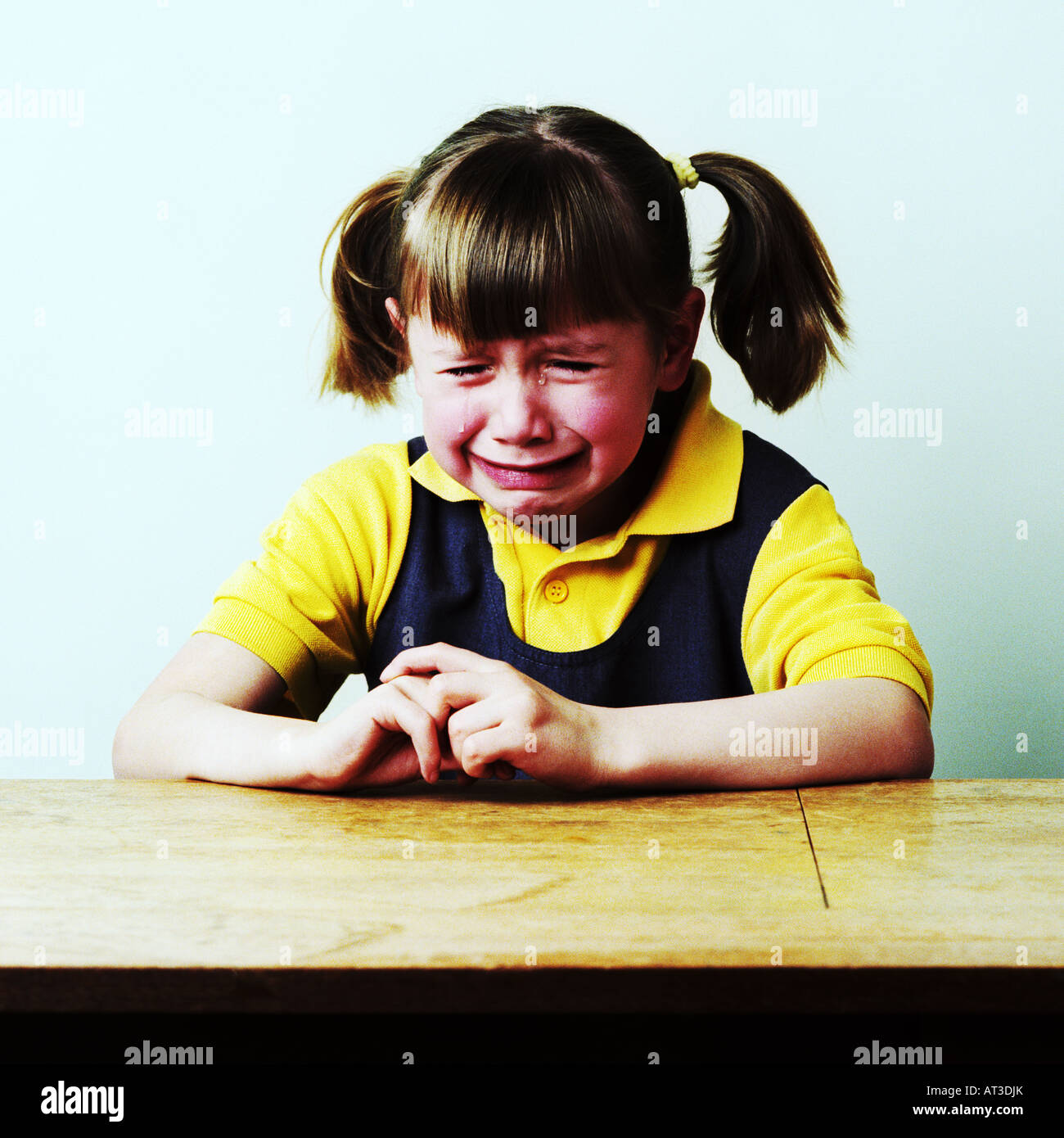A school girl crying Stock Photo