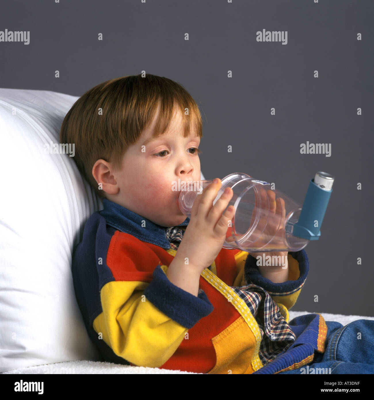Boy with inhaler Stock Photo - Alamy