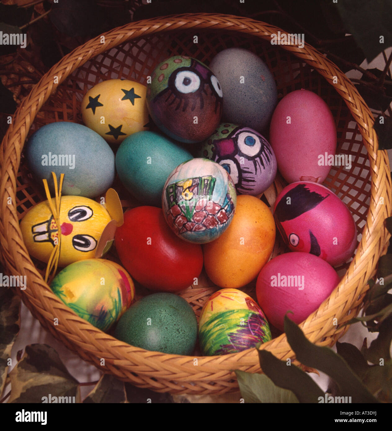 Close Up Of Basket Of Blown Eggs Decorated And Painted In Bright