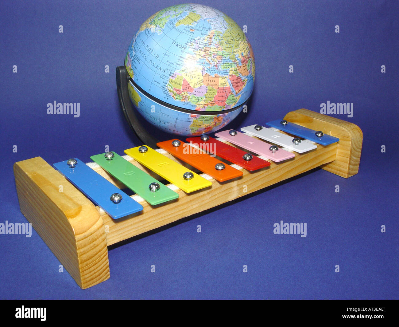 xylophone with a globe as symbol for the world of the music Stock Photo