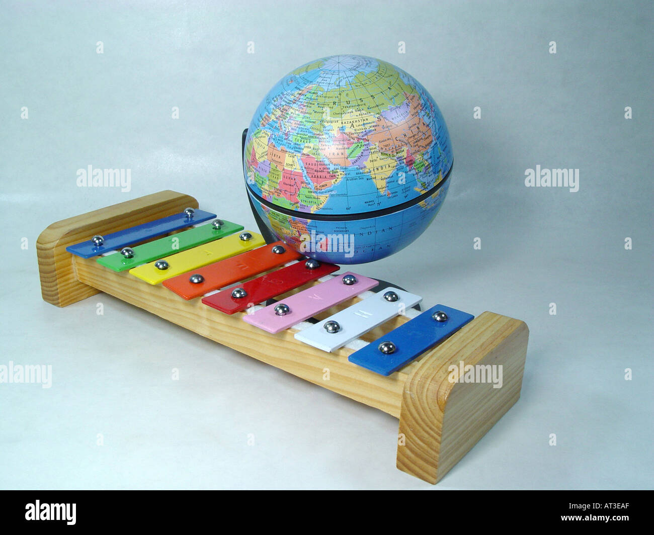 xylophone with a globe as symbol for the world of the music Stock Photo