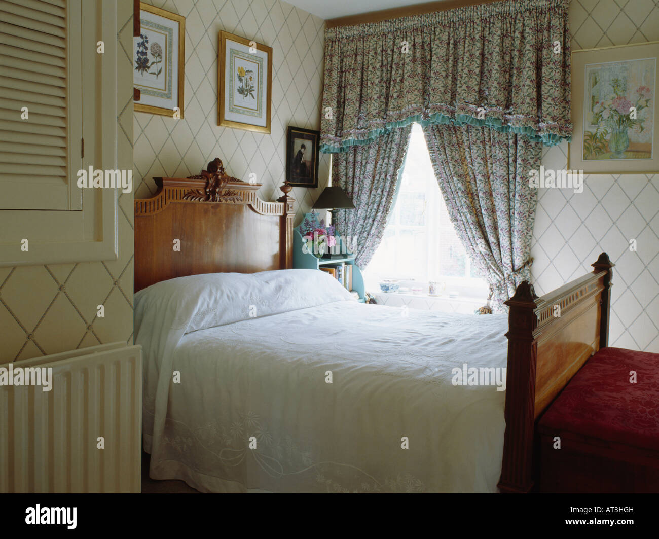 Patterned curtains with deep pelmet in small country bedroom with