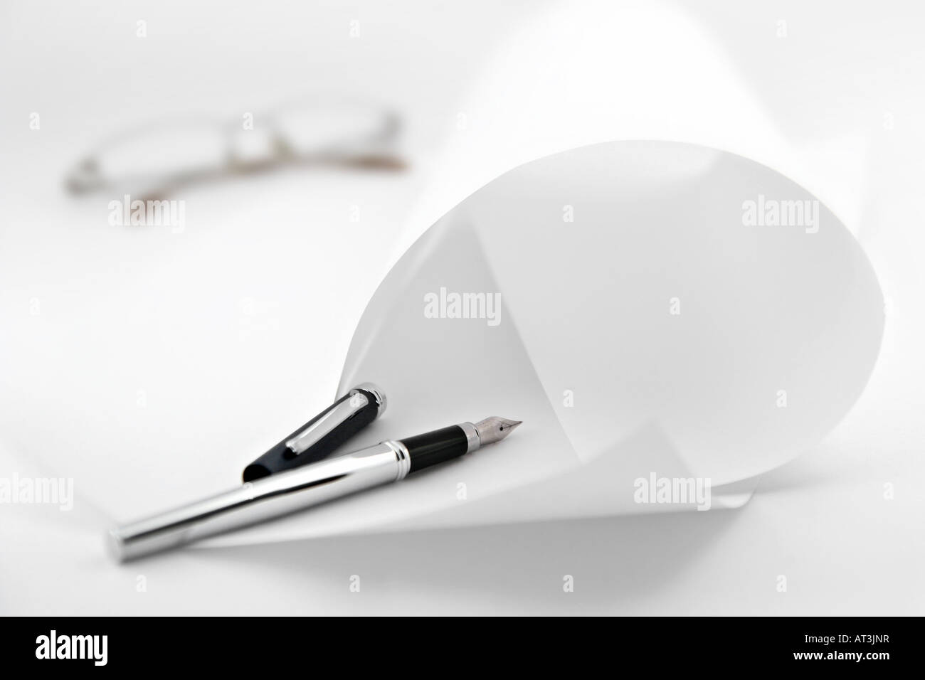 Ink pen with paper Stock Photo - Alamy