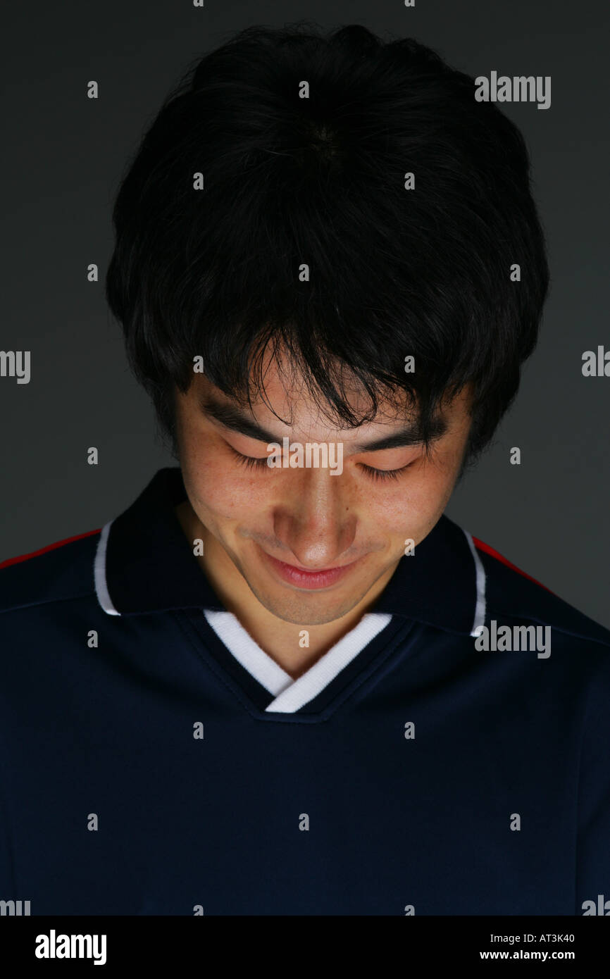 Satisfied soccer player Stock Photo