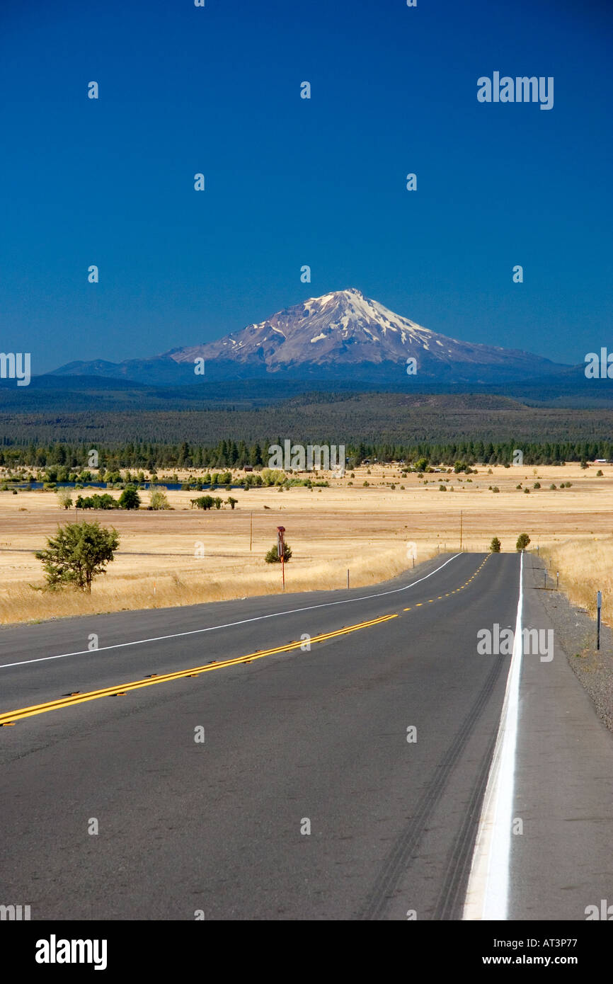 The highway near McArthur, California with a view of Mount Shasta in