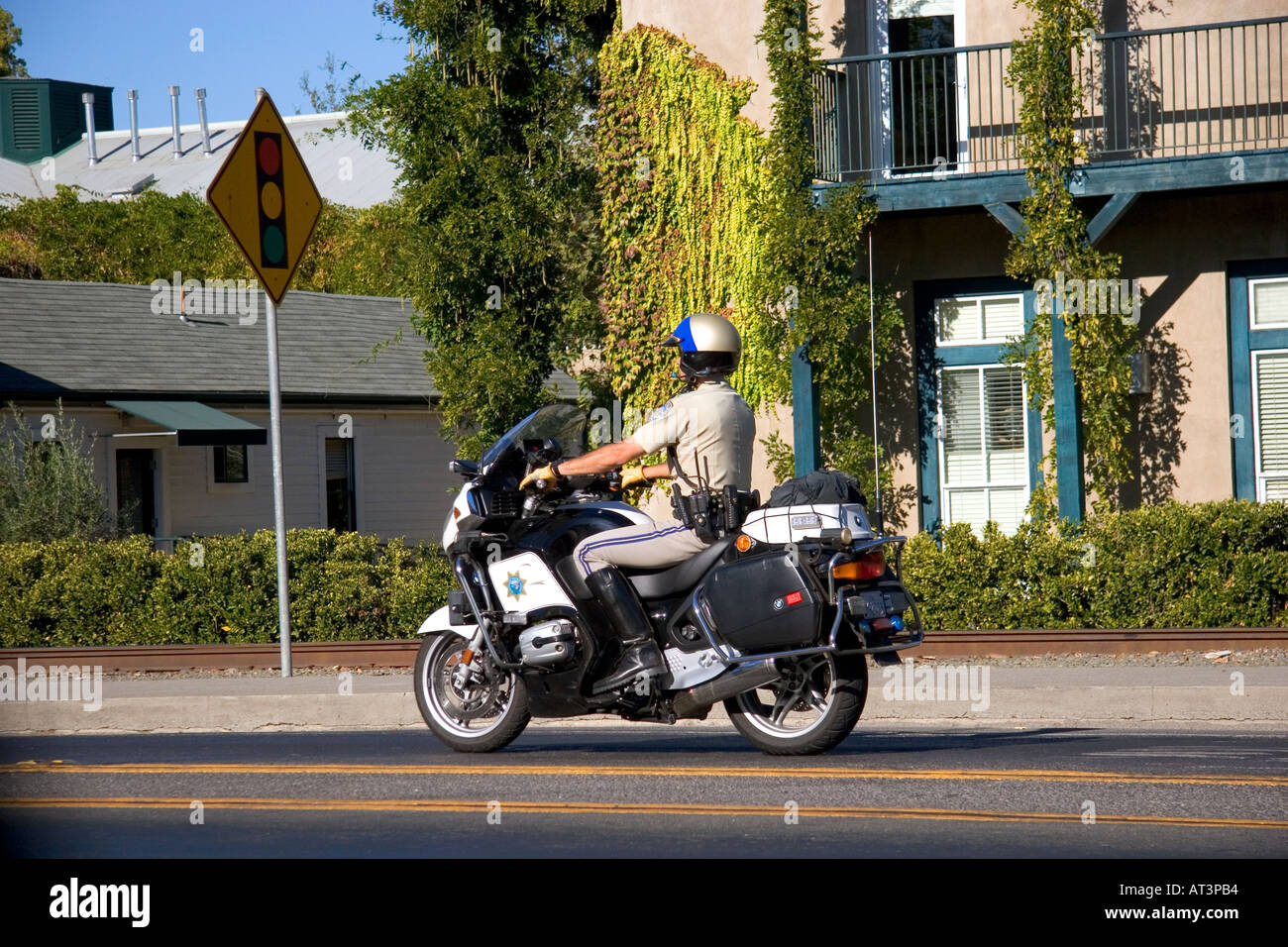 California Highway Patrol officer riding a motorcycle Stock Photo