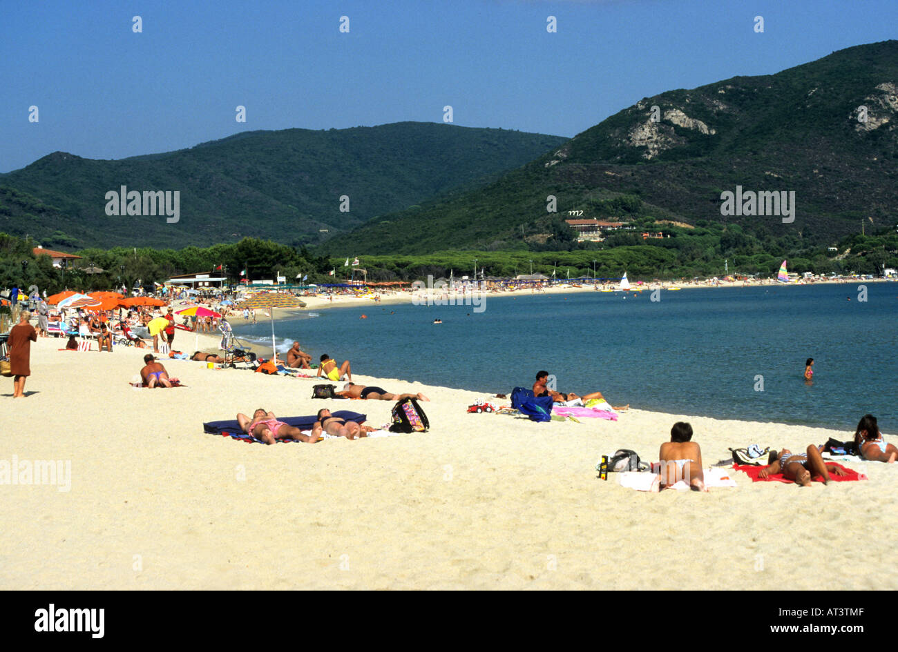 Tourists sunbathing on a Elba Island beach Stock Photo: 9253198 ...