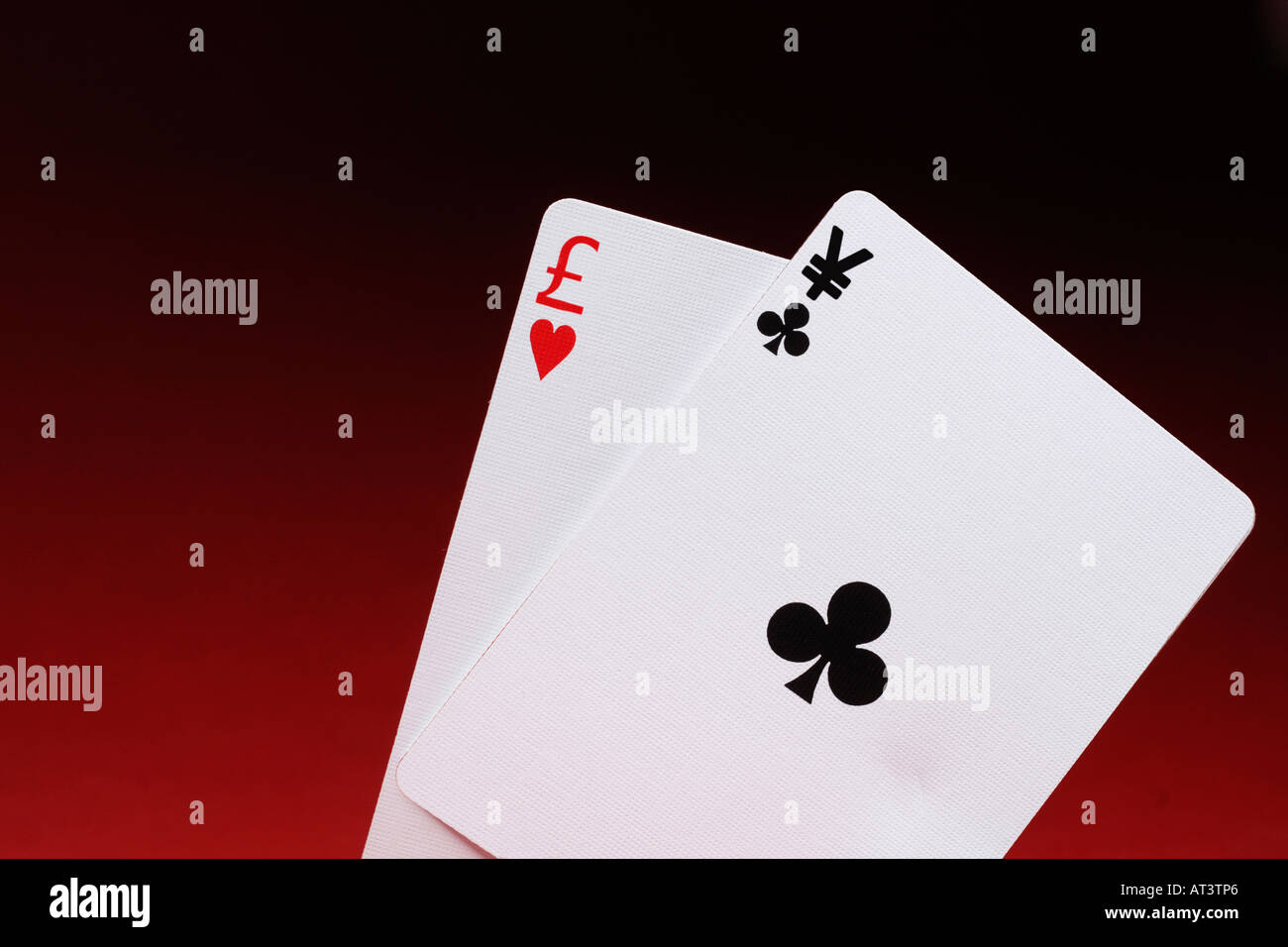Two playing cards with currency symbols Stock Photo - Alamy