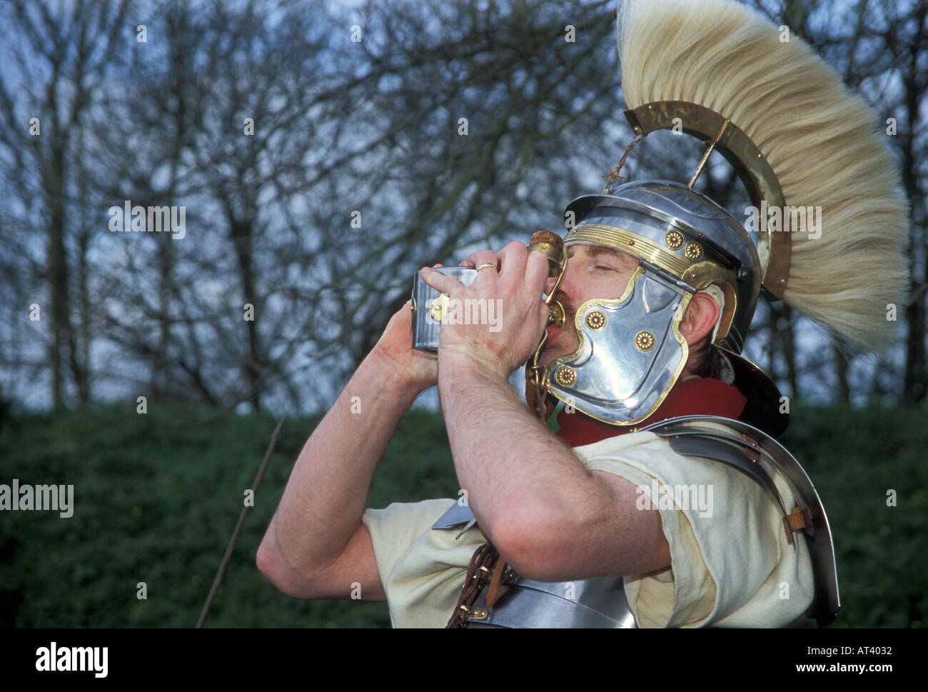 Roman soldiers at Silchester Hampshire UK drinking from a cup Stock Photo