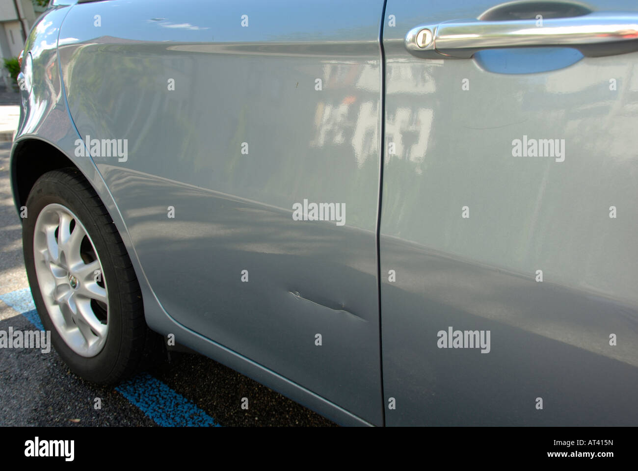 A scar on the door of a new car Stock Photo Alamy