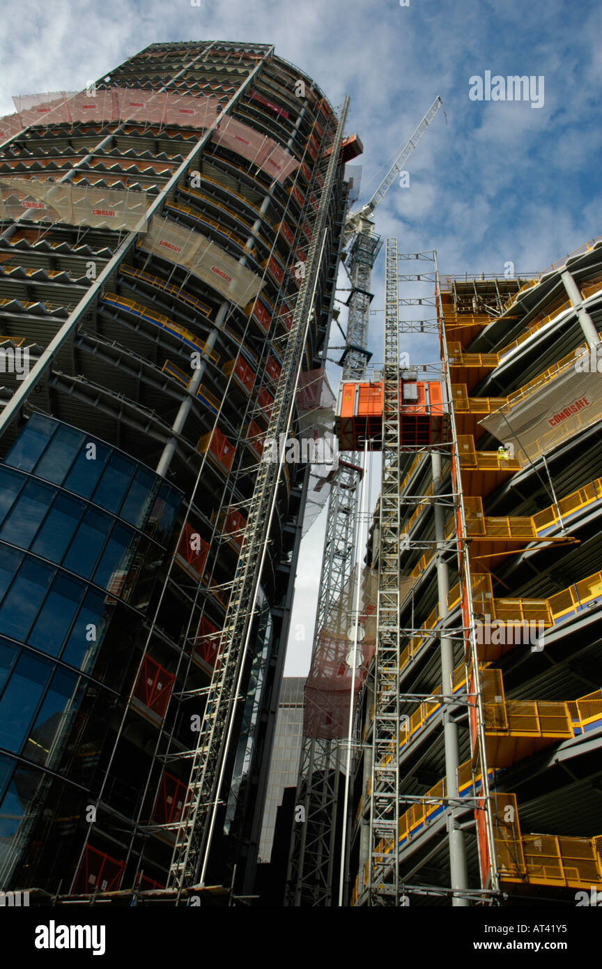 Looking upwards at office buildings under construction Stock Photo - Alamy