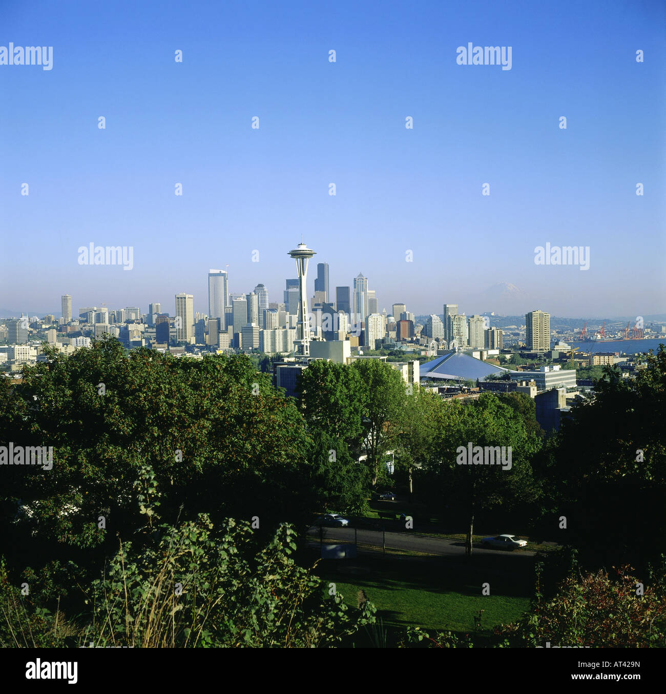 geography / travel, USA, Washington, Seattle, city views, cityscape skyline with Space Needle, Mount Rainier at horizon, , Stock Photo