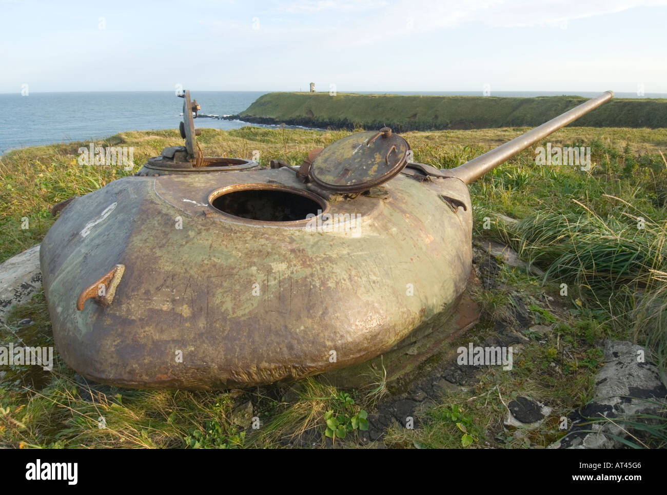 Old world war 2 defensive artillery gun above Yuzhno Kurilsk on Kunashir Island in Kuril Island chain in Russian Far East Stock Photo