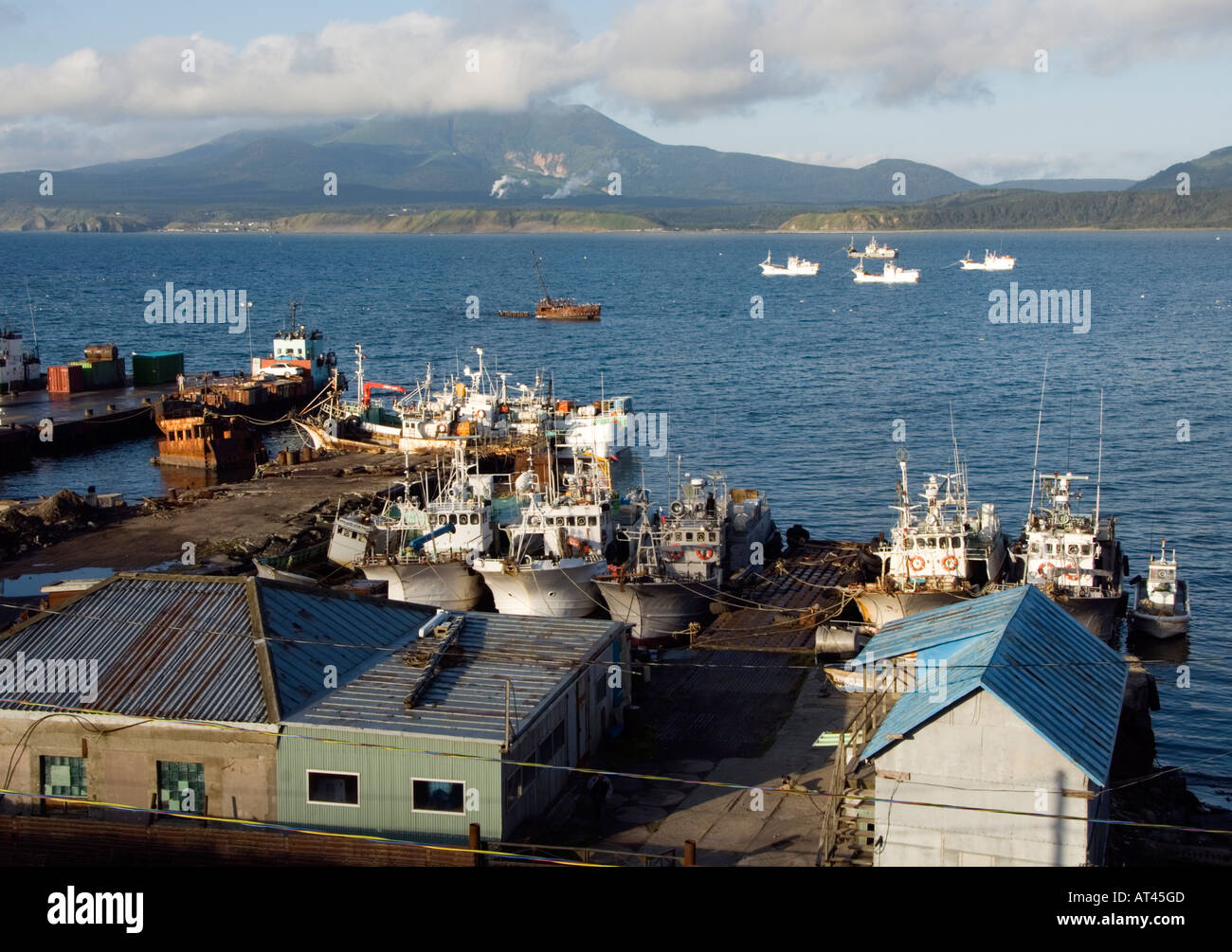 Harbour at Yuzhno Kurilsk on Kunashir Island in Kuril Island chain ...