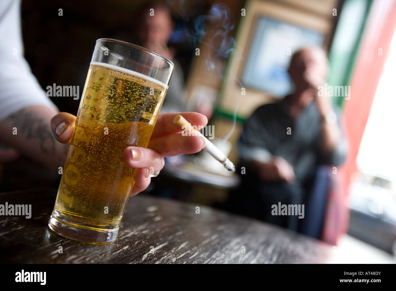 having a beer and a fag in a bar in England just prior to the smoking