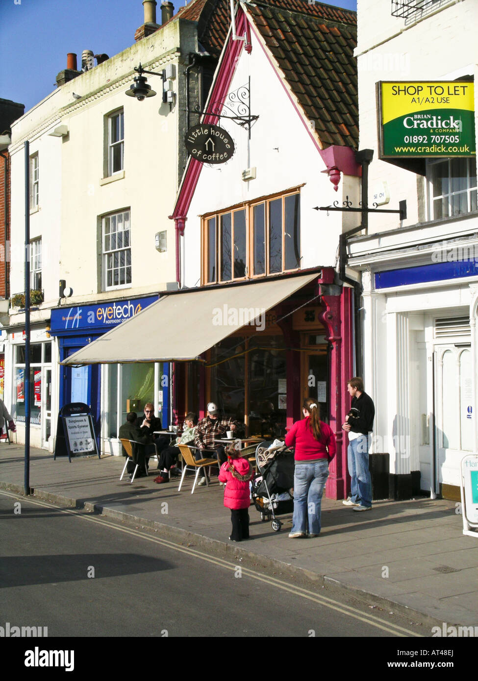 Devizes Wiltshire a small English market town with outdoor cafe and shop to let Stock Photo