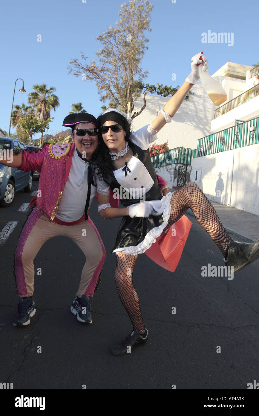 Bullfighter and French maid in high spirits at the Carnaval parade Los Gigantes Tenerife Canary Islands Spain Stock Photo