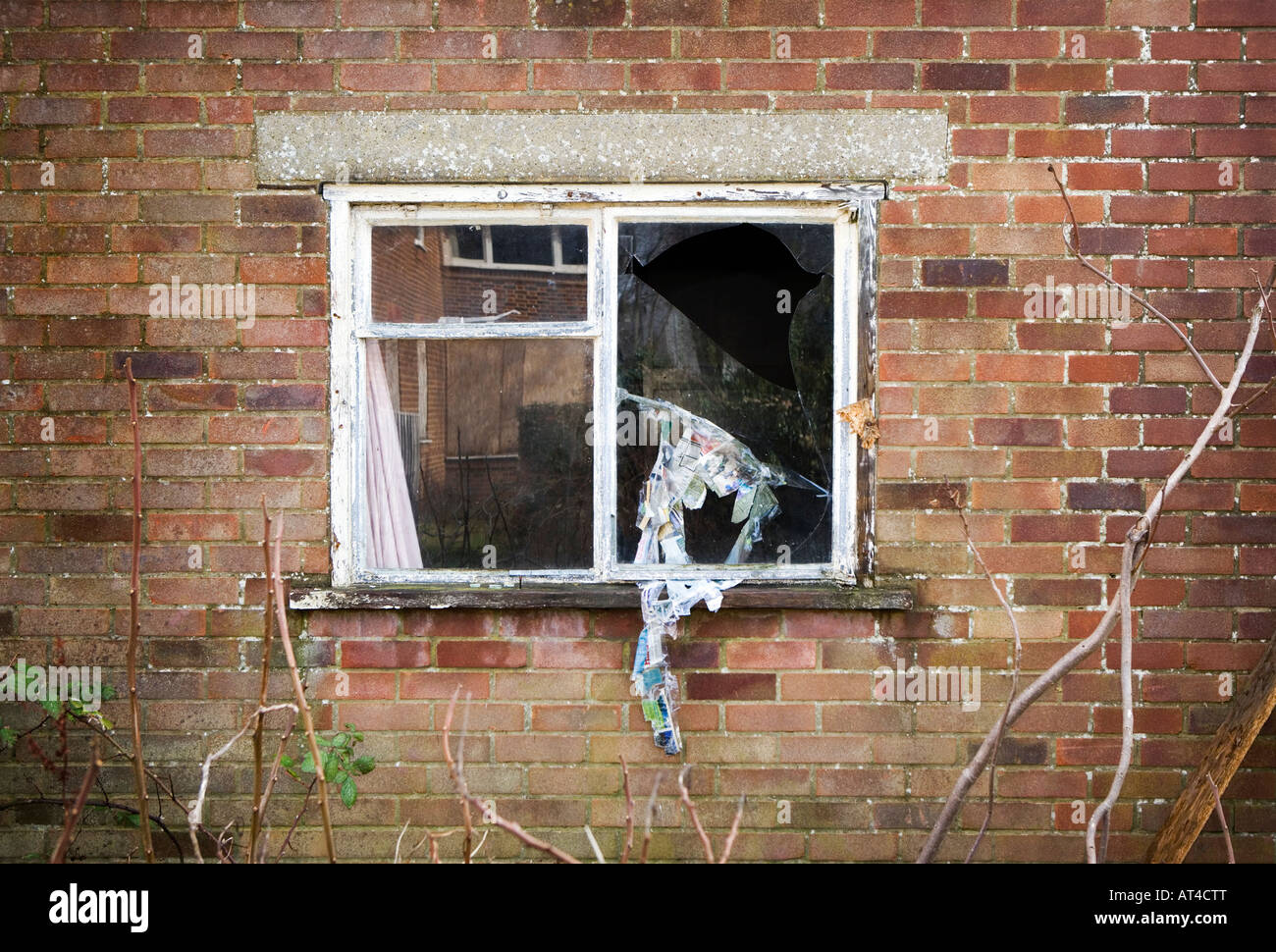 Vandlised disused brick building shot in the uk Stock Photo