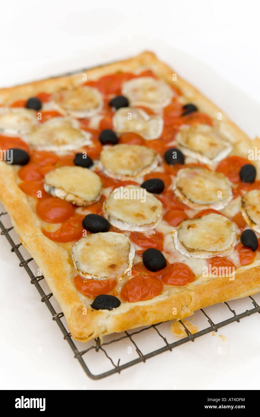 Home baked goats cheese and tomato tart, made with puff pastry and