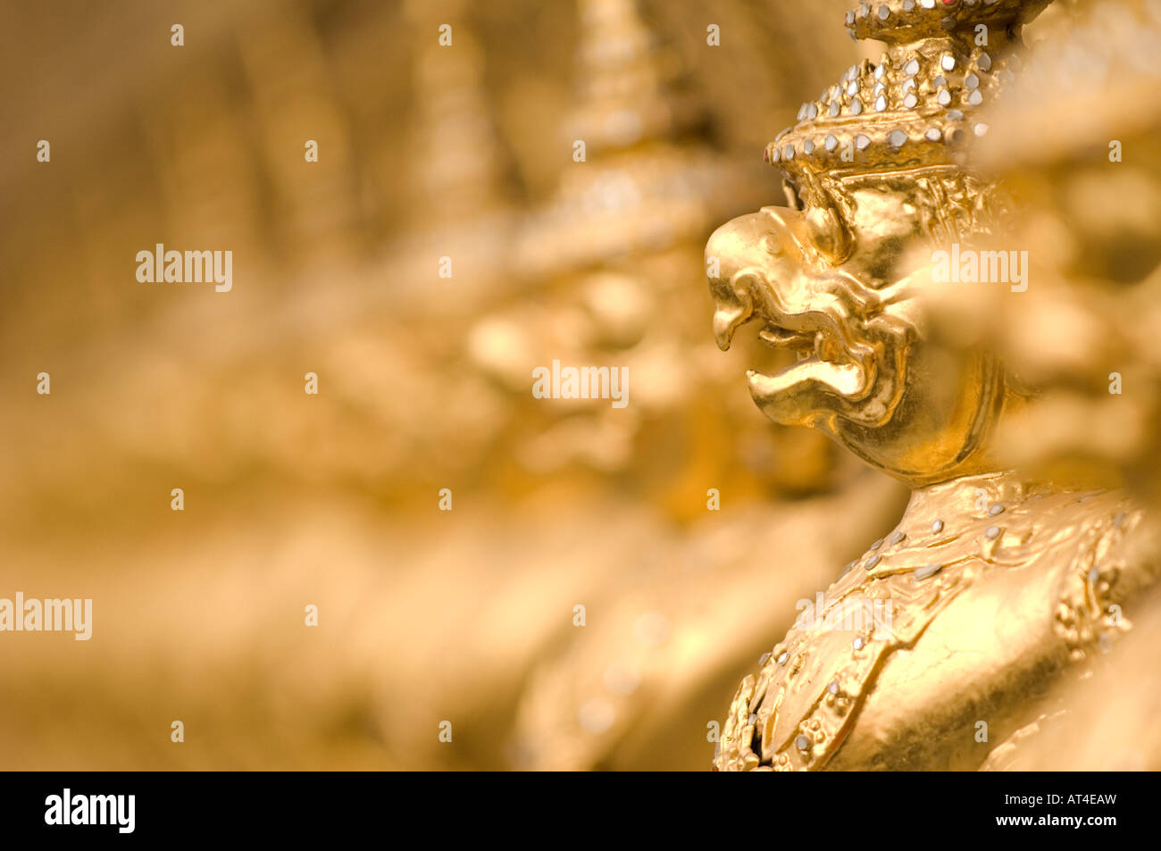 112 Garudas mythical beasts encircle the wat of the Emerald Buddha guard at the grounds of the Grand Palace Bangkok Thailand Stock Photo