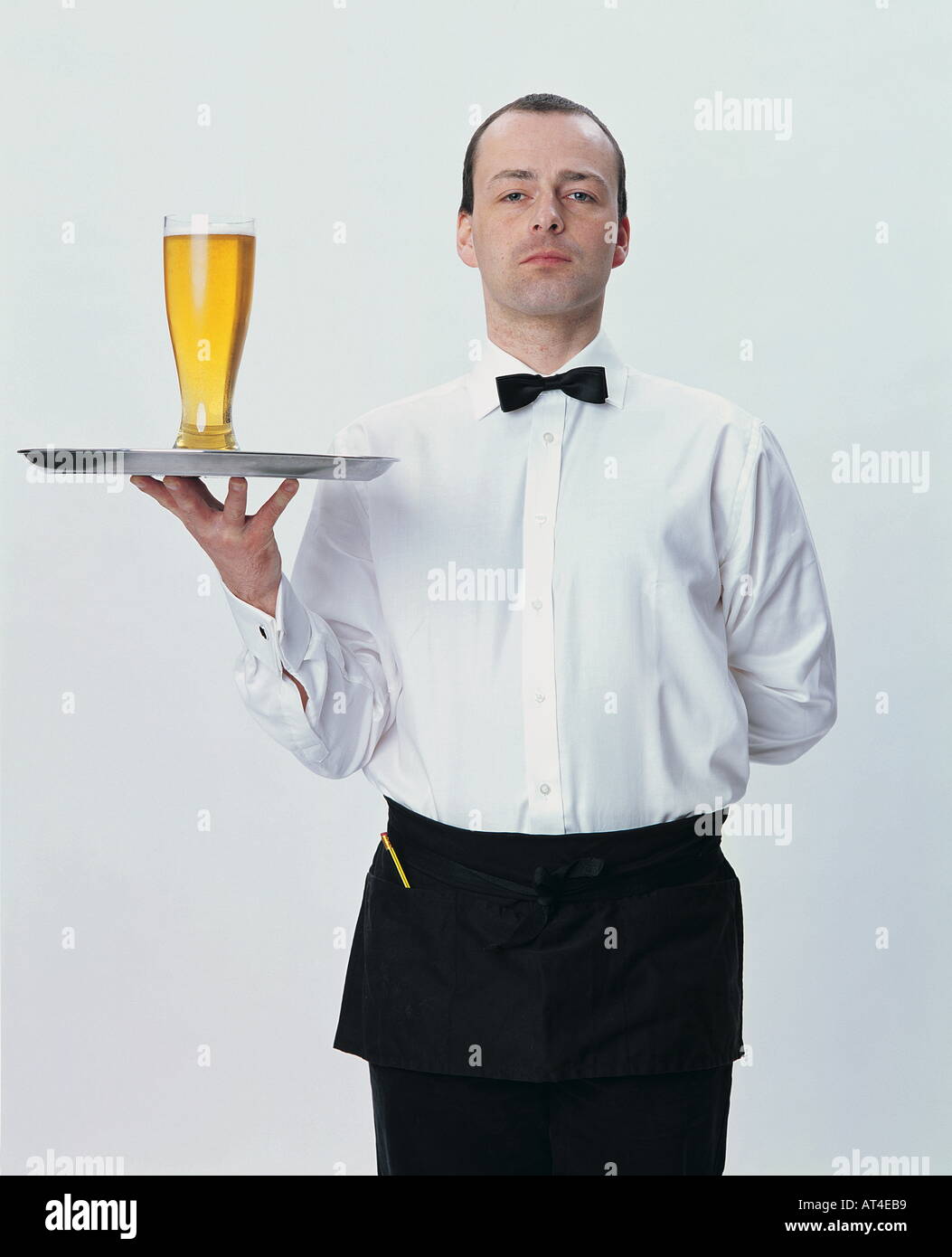 waiter serving beer Stock Photo