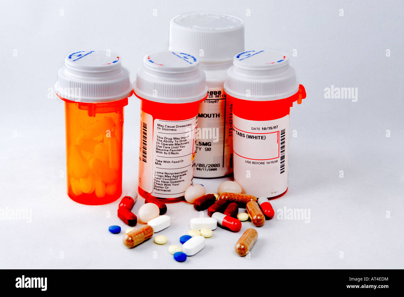 Medicine bottles and pills on a white background Stock Photo