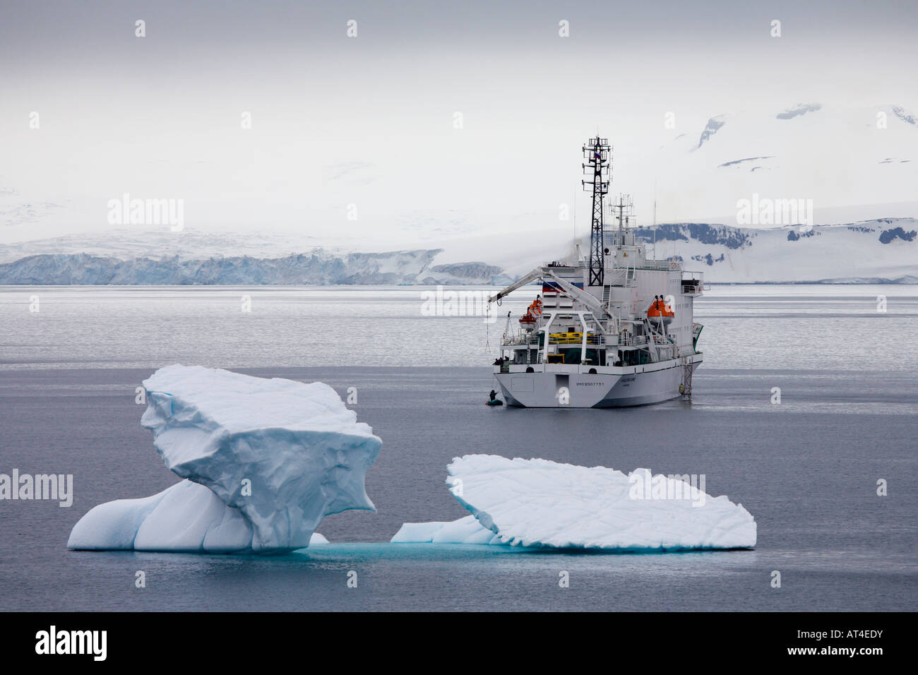 Russian research vessel and tourist ship Akademik Ioffe at Half Moon Island in Antarctica Stock Photo