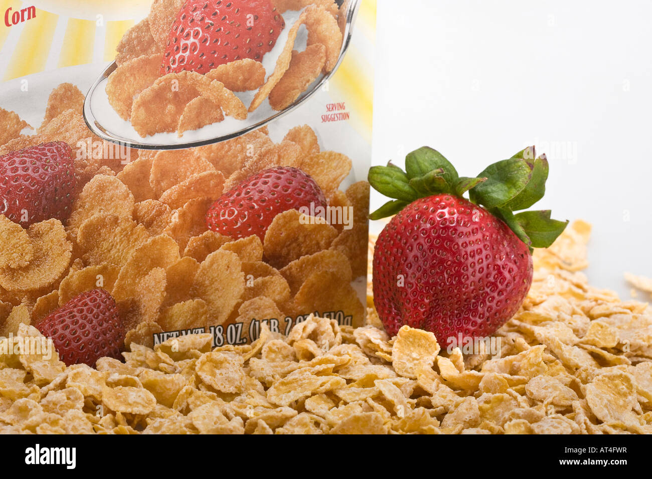 Closeup of breakfast cereals Strawberry fruit and cereal box from
