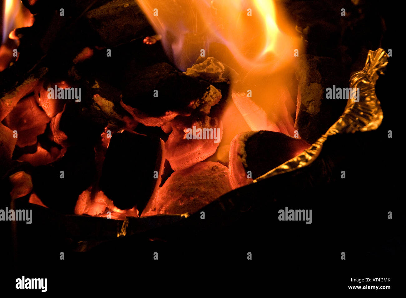 Coals burning and glowing Stock Photo