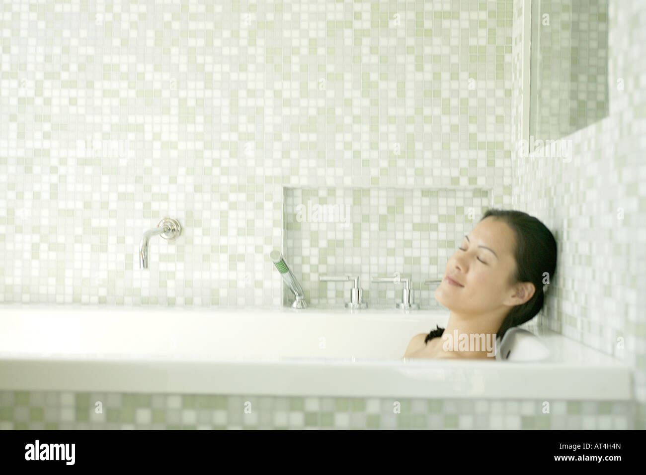 Relaxing woman in bathtub hi-res stock photography and images - Alamy