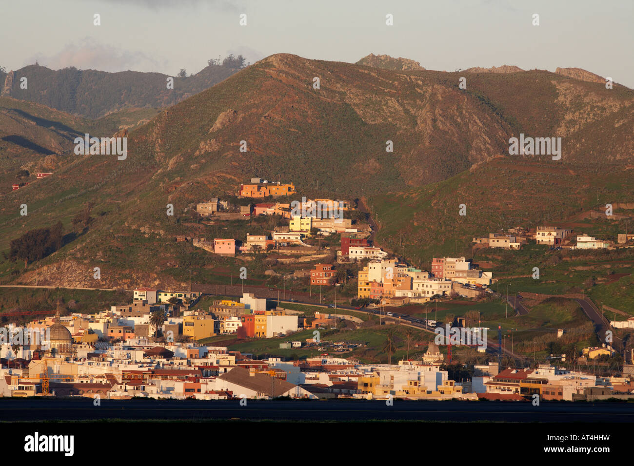 view of housing developments and typical canarian buildings built onto ...