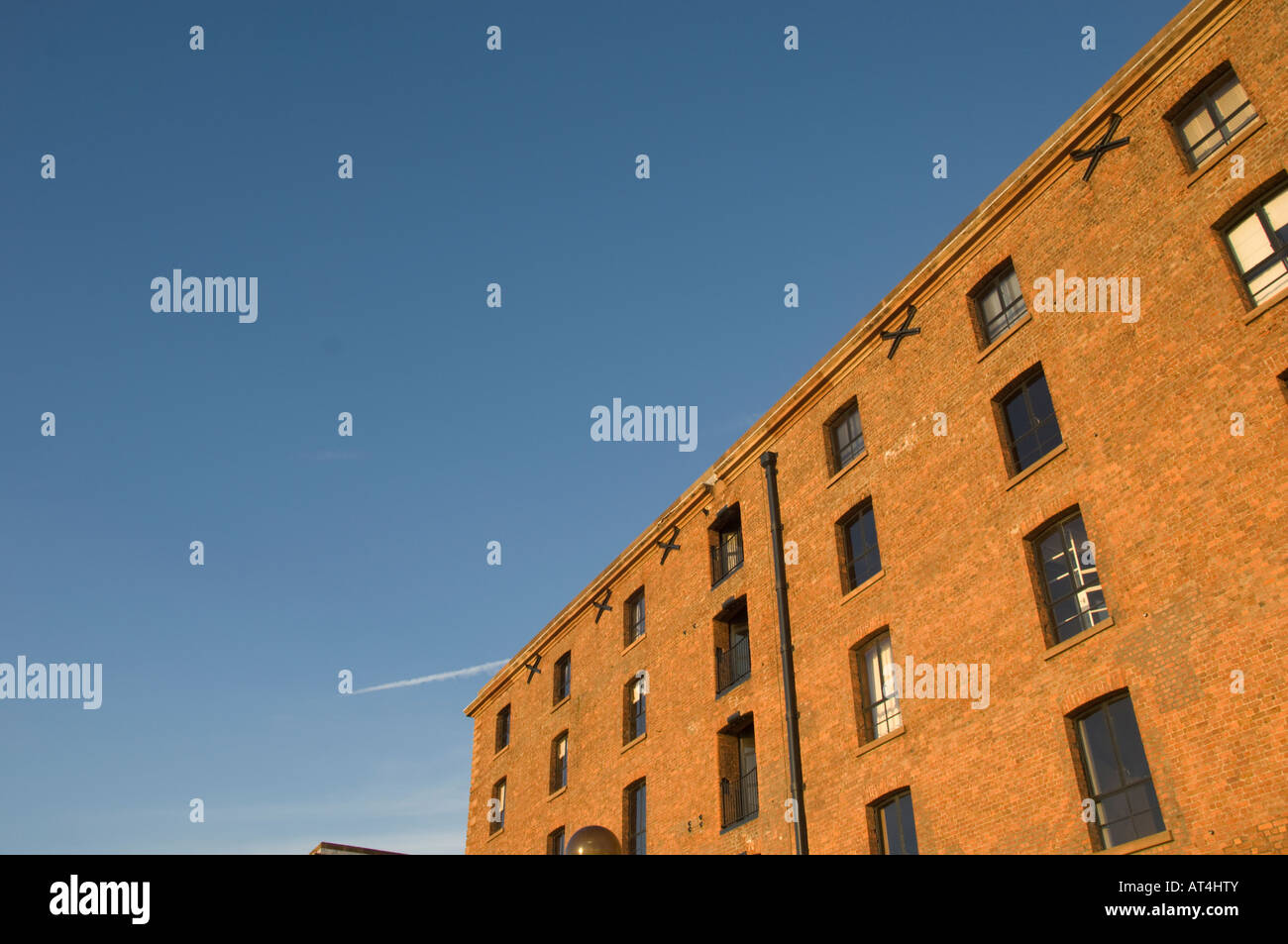 Albert Dock Liverpool at sunset old warehouses converted into luxury