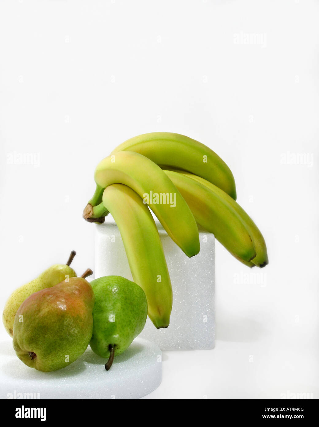 Pears and bananas fruits on white background hires Stock Photo Alamy