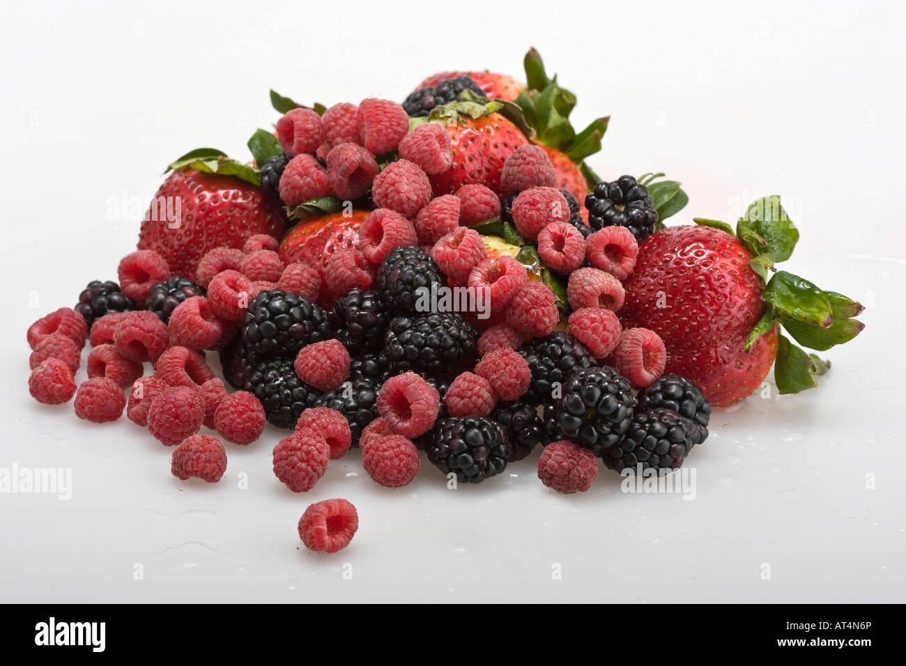 Horizontal Rasberries Strawberries Blackberries Raspberries from above overhead isolated ...