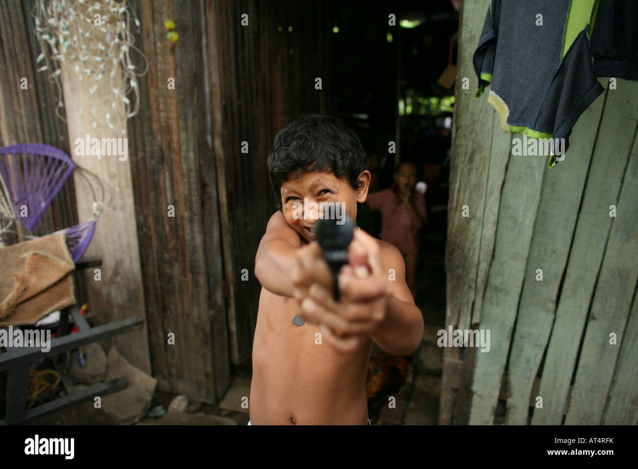 Children joining local gangs who become extremely violent Stock Photo