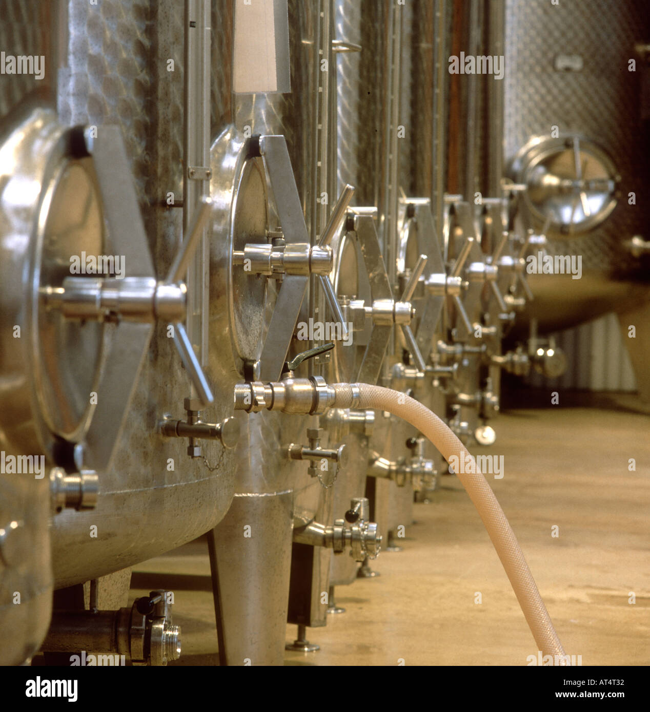 Vating Looking along stainless steel wine vats where English wine is being ...