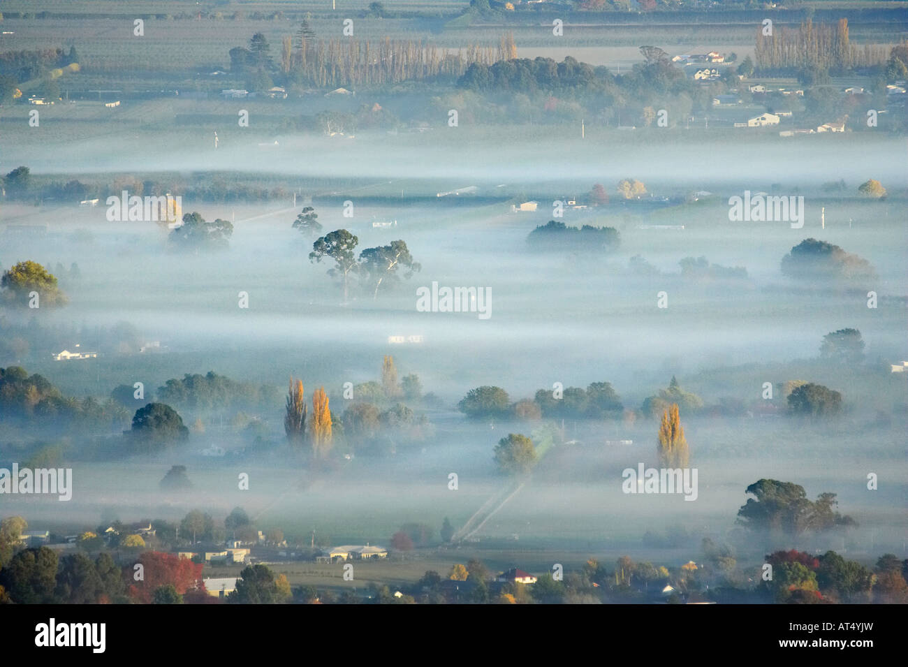 View from Te Mata Peak of Early Morning Mist over Havelock North Hawkes Bay North Island New Zealand Stock Photo