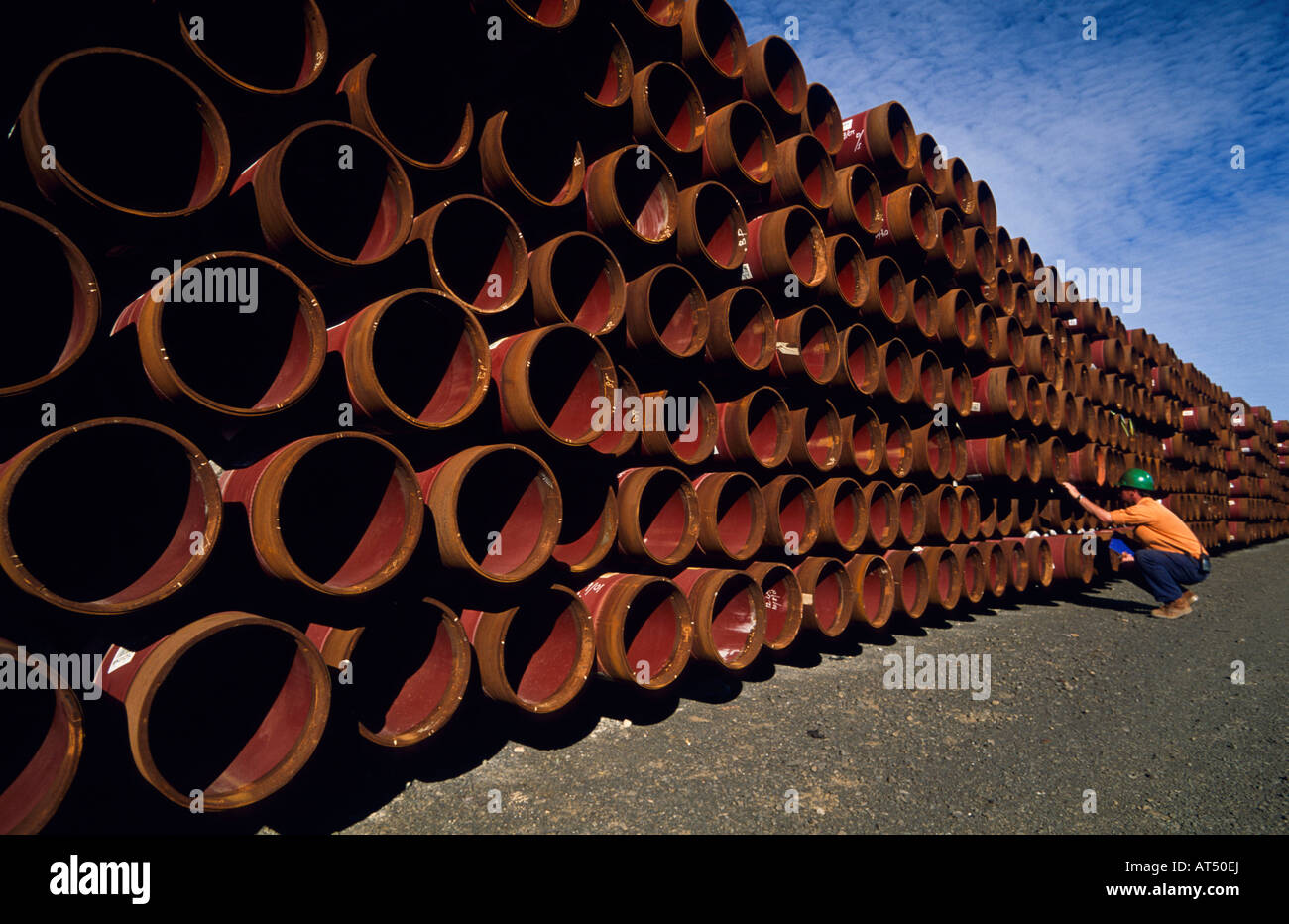 Workers checking [natural gas] pipes Stock Photo