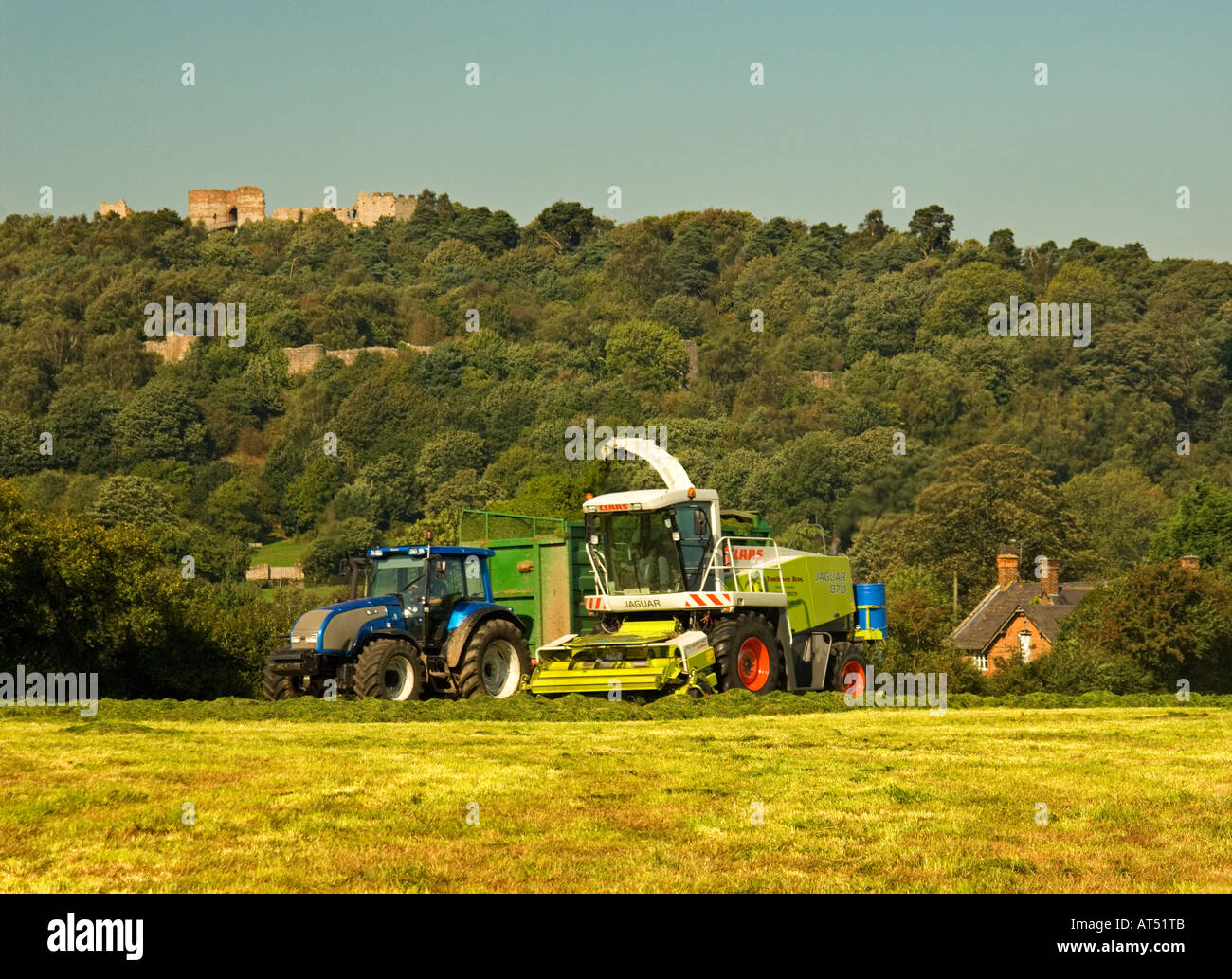 Tractor & Combine Harvester Collecting Crops Below Beeston Castle