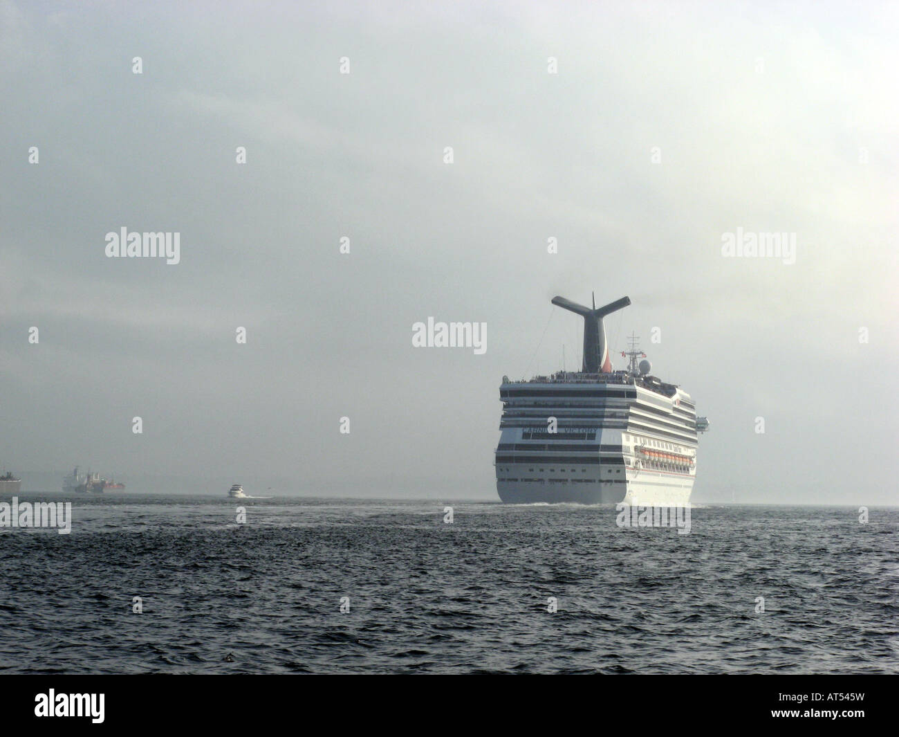 The cruise ship, Carnival Victory, leaving Upper New York Bay, bound for the Atlantic Ocean. Stock Photo